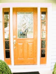 Light brown front door installation by Fairview Home Improvement in Cleveland, Ohio area