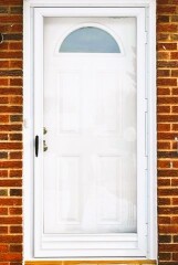 Storm door & white front door installation by Fairview Home Improvement in Cleveland, Ohio area