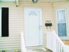 White front door installation by Fairview Home Improvement in Cleveland, Ohio area