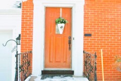 Brown front door installation by Fairview Home Improvement in Cleveland, Ohio area