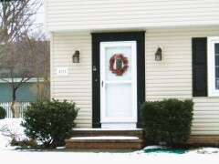 Storm door & white front door installation by Fairview Home Improvement in Cleveland, Ohio area