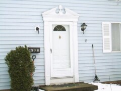 Storm door & white front door installation by Fairview Home Improvement in Cleveland, Ohio area