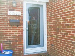 White storm door & white front door installation by Fairview Home Improvement in Cleveland, Ohio area