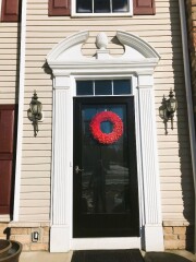 White storm door & dusky blue framed, see-through front door installation by Fairview Home Improvement in Cleveland, Ohio area