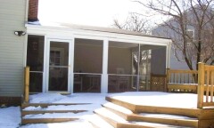 White patio enclosure installed by Fairview Home Improvement in Cleveland, Ohio area