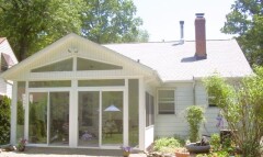 White patio enclosure installed by Fairview Home Improvement in Cleveland, Ohio area