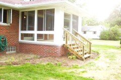 White patio enclosure installed by Fairview Home Improvement in Cleveland, Ohio area