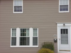 Dark tan siding installed by Fairview Home Improvement in Cleveland, Ohio area