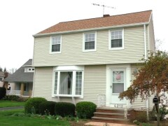 Tan siding installed by Fairview Home Improvement in Cleveland, Ohio area