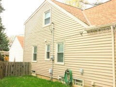 Tan siding installed by Fairview Home Improvement in Cleveland, Ohio area