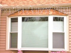 Bow replacement windows installed by Fairview Home Improvement in Cleveland, Ohio area