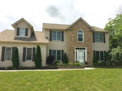 Multiple single hung replacement windows and arched window installed by Fairview Home Improvement in Cleveland, Ohio area