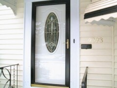Dark colored front door installation by Fairview Home Improvement in Fairview Park, Ohio